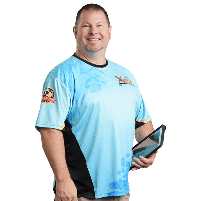 Estimator of Xtreme Services holding a tablet